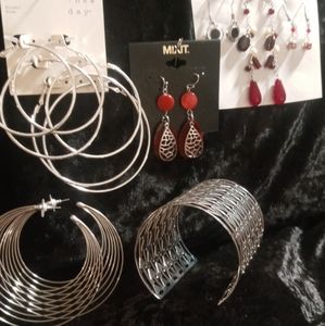 1 cuff bracelet 8 pairs of earrings silver and red .